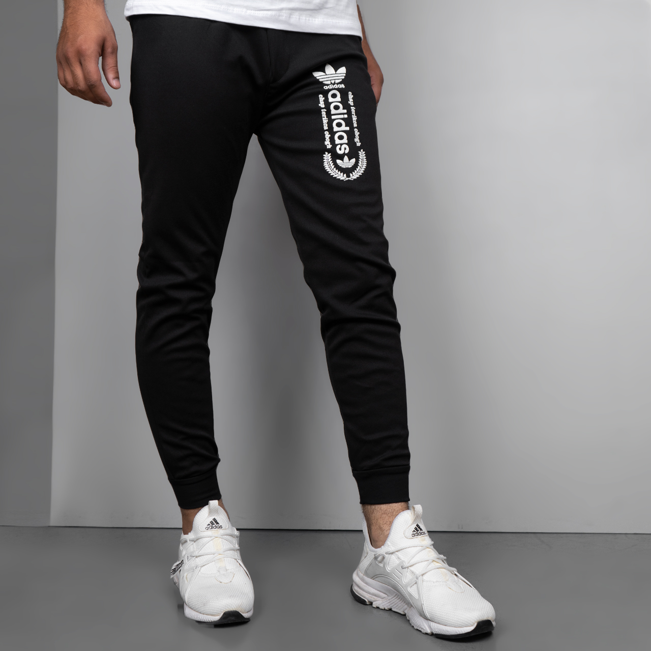 شلوار اسلش مردانهAdidas (T)مدل AT74