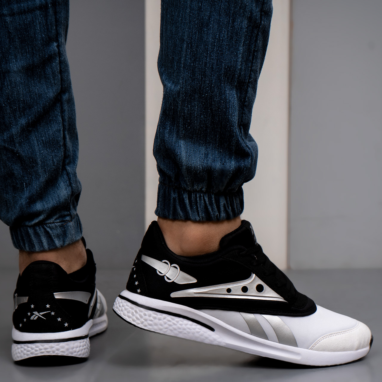 کفش ورزشی ریبوک مشکی سفید مردانه مدل 25CC