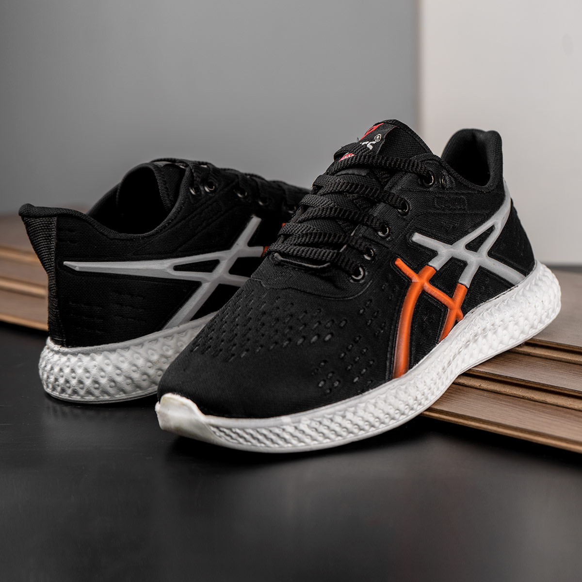 کفش ورزشی Asics مردانه مشکی نارنجی مدل Nardin(T)